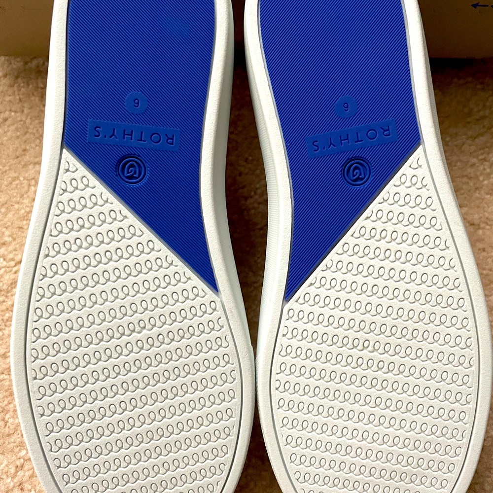 New in box Rothys white gym shoes.  Never been worn size 6